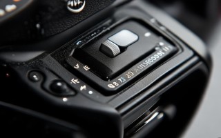 d7000镜头上个开关是什么用